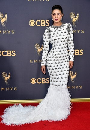 Mmm: Actress Priyanka Chopra shines in Lorraine Schwartz jewellery. The shape of the Balmain gown is flattering but the details and feathers take away from it.