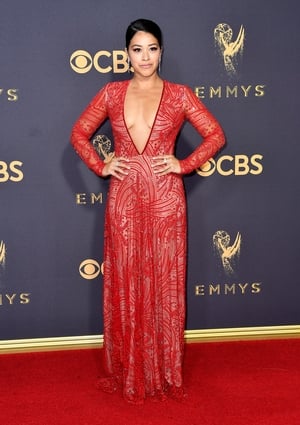 Gina Rodriguez wore a revealing floor length dress from Naeem Khan.