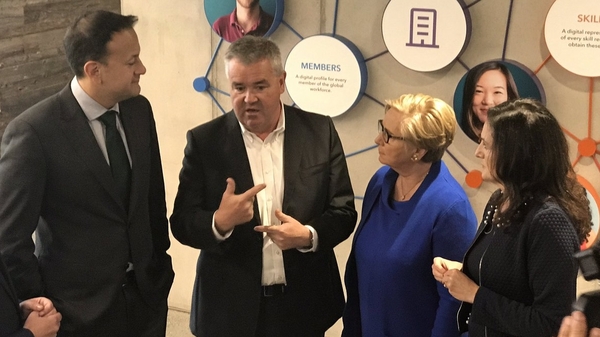 Taoiseach Leo Varadkar (L) and Tánaiste Frances Fitzgerald (2nd R) at the LinkedIn opening