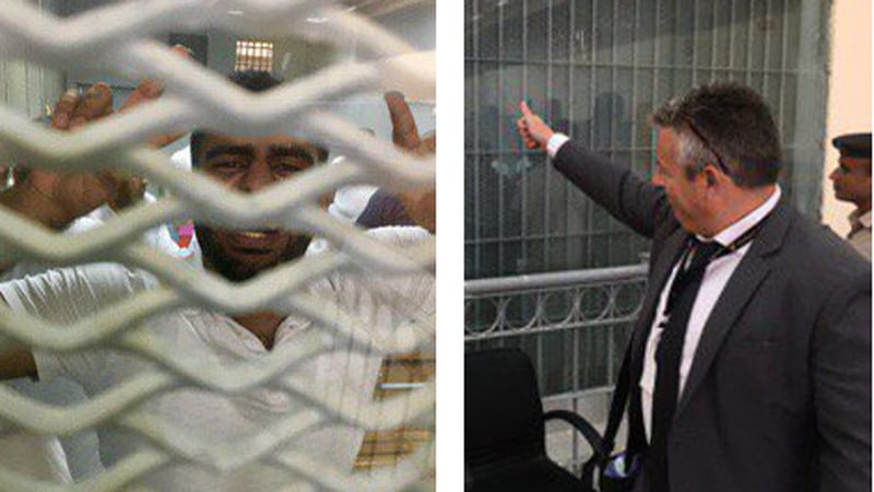 Ibrahim Halawa after his acquittal was announced, and Irish consul Shane Gleeson gesturing to him after the verdict (Pics: @declanwalsh)