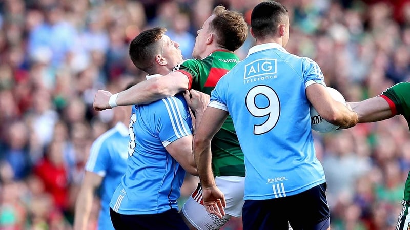 Mayo's Donie Vaughan strikes John Small of Dublin
