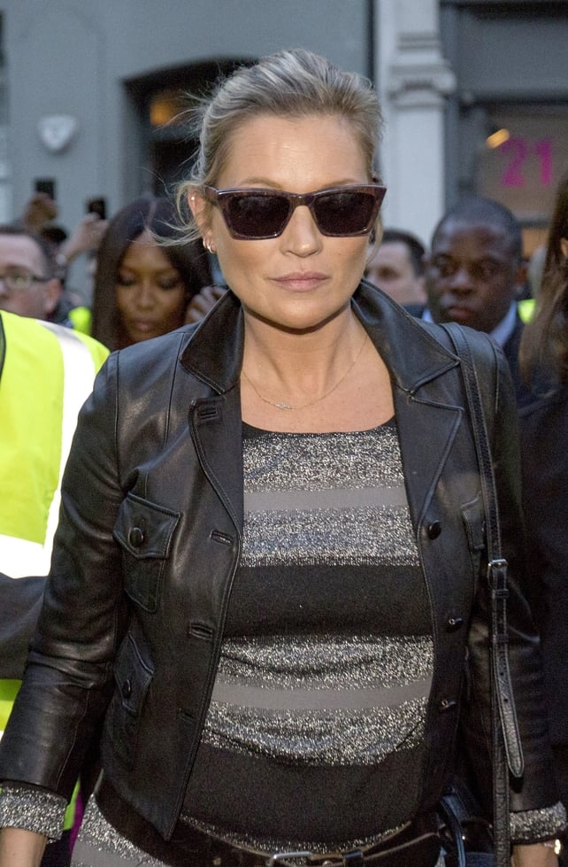 Kate Moss arriving for Burberry show wearing Burberry during London Fashion Week.