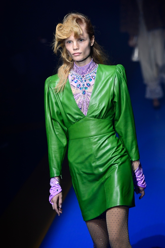 Now there's an unforgettable green leather dress spotted at the Gucci show.