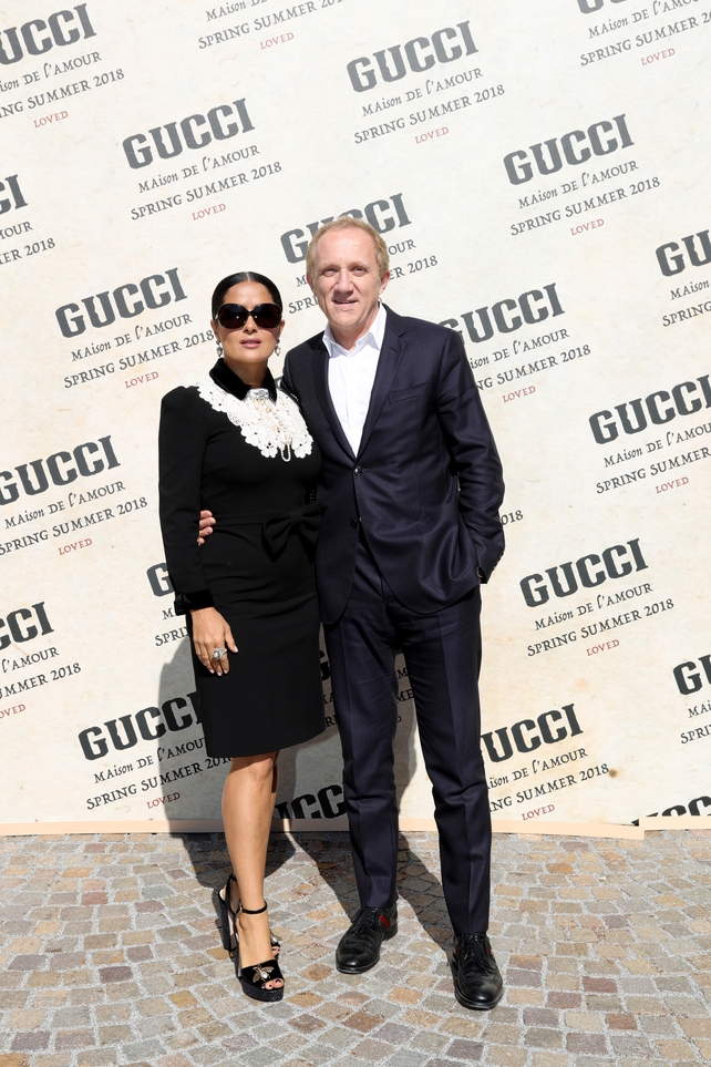 Salma Hayek and husband Francois-Henri Pinault at the Gucci show during Milan Fashion Week on Wednesday September 20.