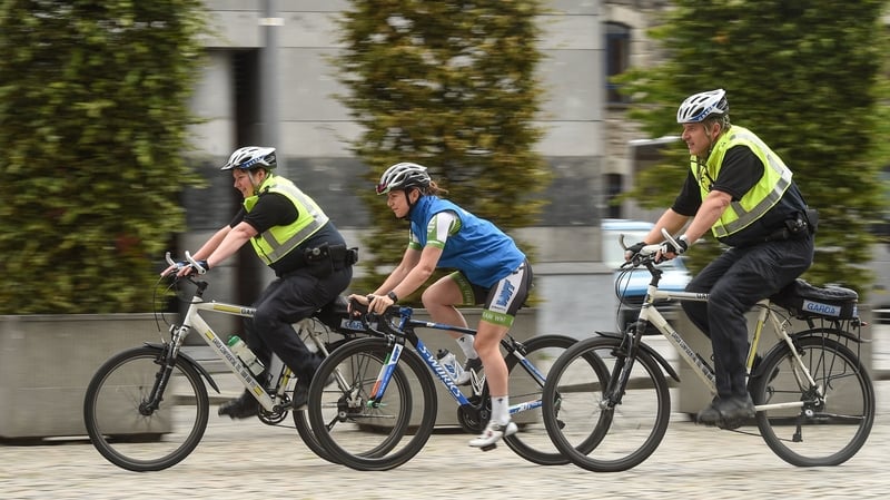 Boylan, centre, cycling through Dublin