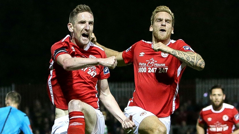 Ian Bermingham (L) celebrates his goal against Shamrock Rovers