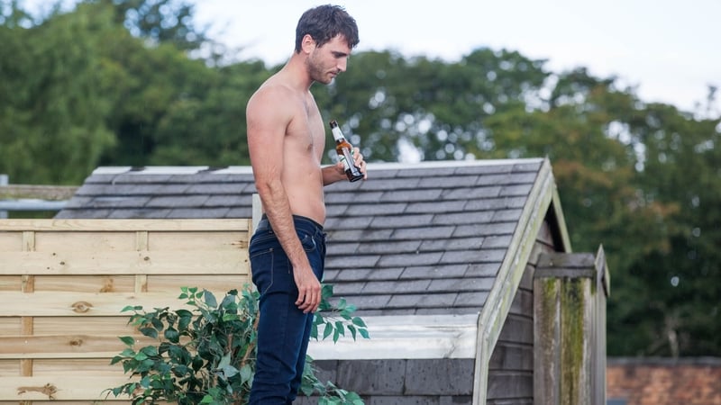 An emotional Damon downs his sorrows...teetering on the edge of a rooftop