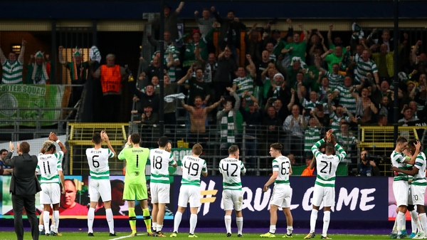 Brendan Rodgers' team applaud the fans who made the trip to Brussels