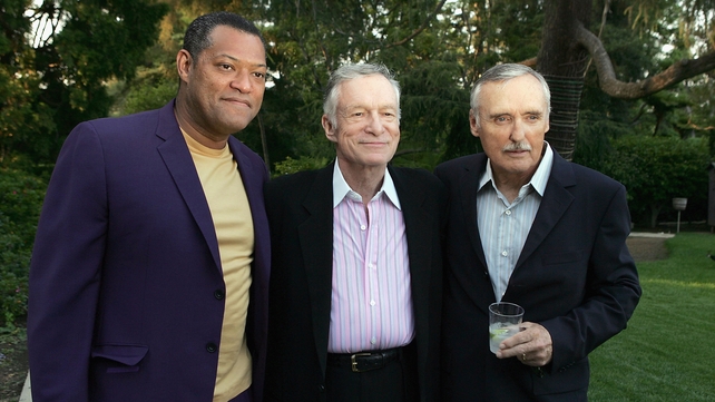 Actors Laurence Fishburne and Dennis Hopper pose with Hugh Hefner at a special screening of Dennis Hopper's The Last Movie at the Playboy Mansion, 2005