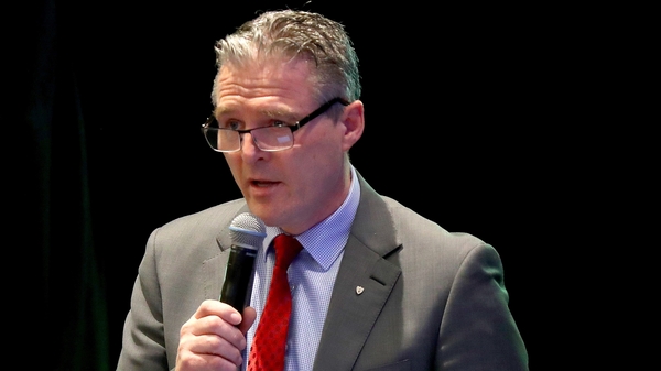 Burns speaking on the floor at Annual Congress
