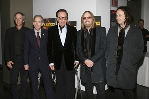 Rain or shine, a singer needs his sunglasses. Tom Petty and the Heartbreakers with director Peter Bogdanovich and Mike Campbell at the launch of 'Tom Petty and The Heartbreakers Runnin' Down A Dream' book in 2007