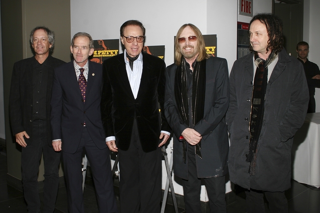 Rain or shine, a singer needs his sunglasses. Tom Petty and the Heartbreakers with director Peter Bogdanovich and Mike Campbell at the launch of 'Tom Petty and The Heartbreakers Runnin' Down A Dream' book in 2007