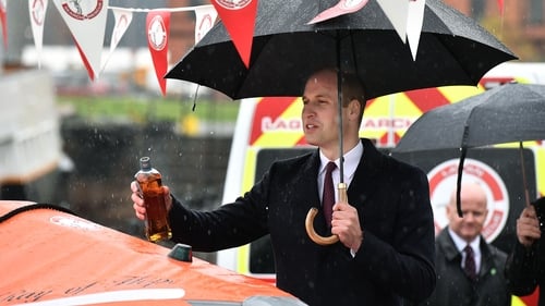 Prince William christened a new rescue boat in Belfast with a dash of Bushmills whiskey