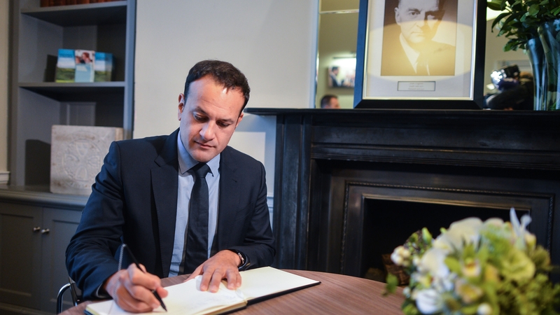 Taoiseach Leo Varadkar signs a book of condolence for Liam Cosgrave