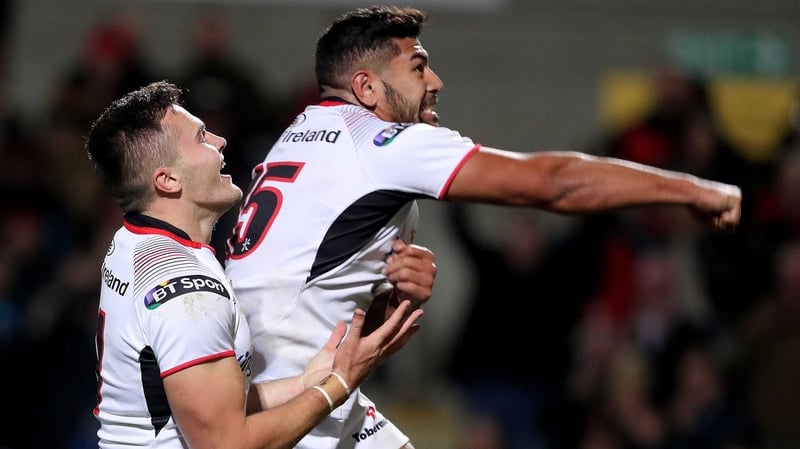 Ulster's Jacob Stockdale celebrates his try with Charles Piutau