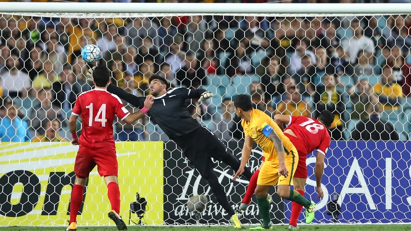 Tim Cahill heads the winner for Australia