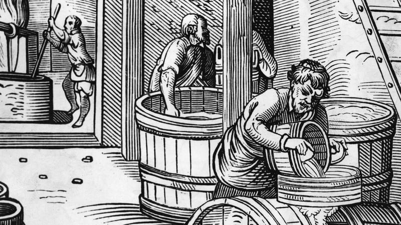 Workers in a brewery circa 1550