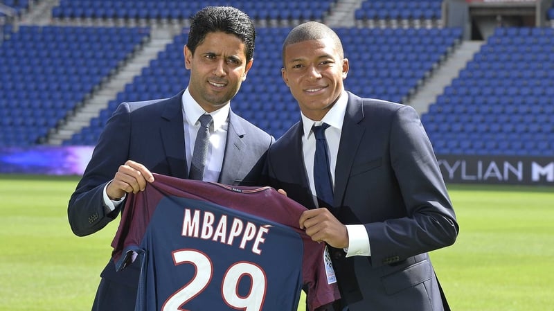 Nasser Al Khelaifi (L) with Kylian Mbappé