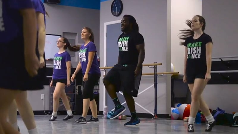 Alex Collins with his classmates at the Drake School of Irish Dance Screengrab: The MMQB/Sports Illustrated