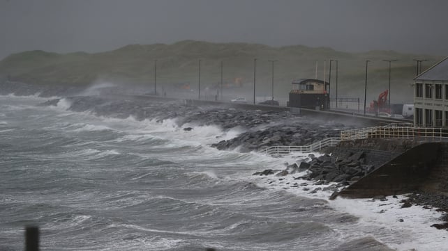 Waves and sea spray hit Lahinch, in Co Clare