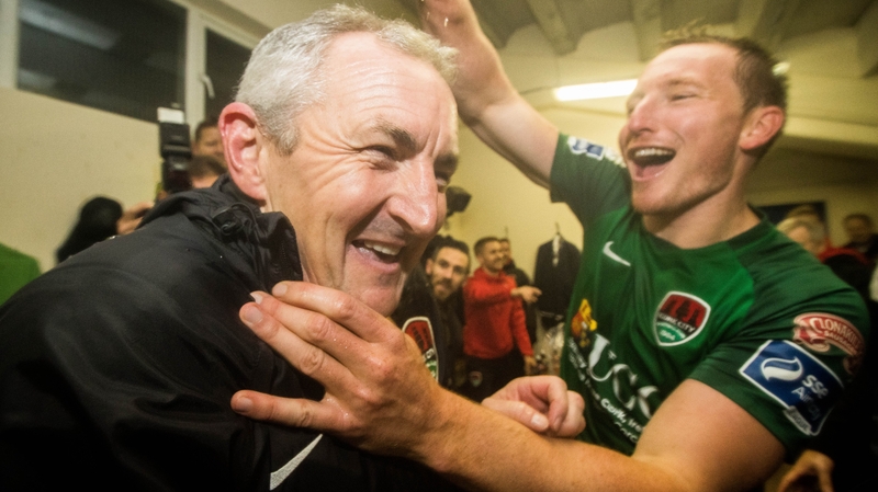 Caulfield celebrates in the dressing room after the game