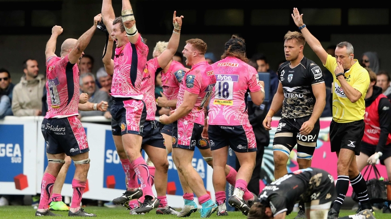 Exeter players celebrate at the final whistle