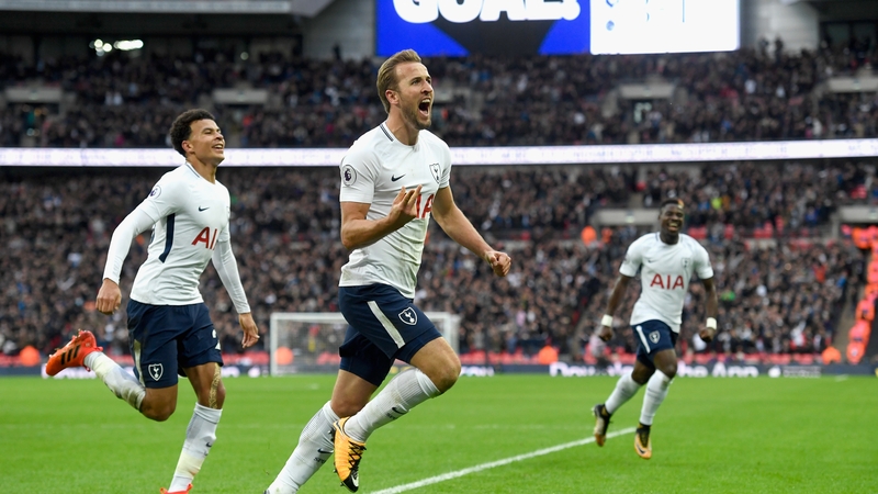 Harry Kane celebrates after scoring his second and Spurs's fourth