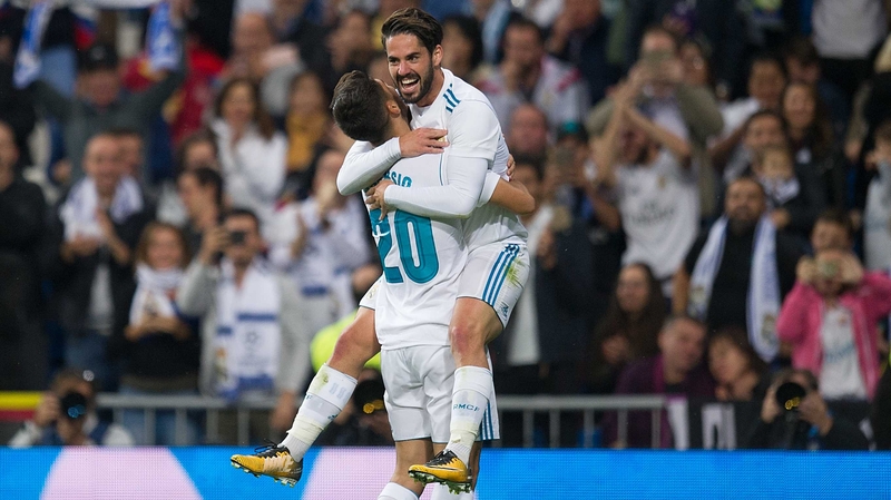 Marco Asensio (L) celebrates his goal with Isco