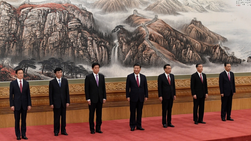 The seven men were all born after China's Communist revolution in 1949