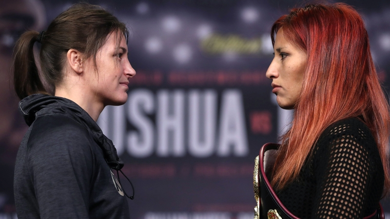 Katie Taylor (L) stares down Argentinian Anahi Sanchez