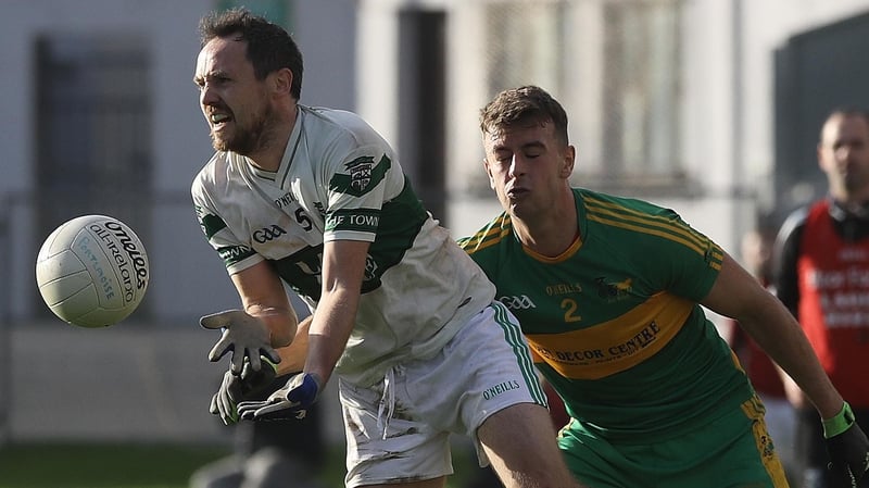 Rhode's Dylan Kavanagh tackles Brian Mulligan of Portlaoise