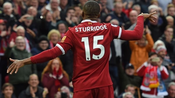 Daniel Sturridge celebrates his well-taken goal against Huddersfield Town at Anfield