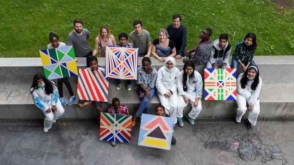 Young people from the Arriving into View Direct Provision project at Cork's Glucksman Art Gallery 
with artists leading the work.