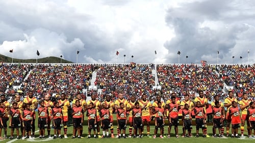 Papua New Guinea embrace for their national anthem