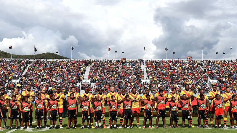 Papua New Guinea embrace for their national anthem