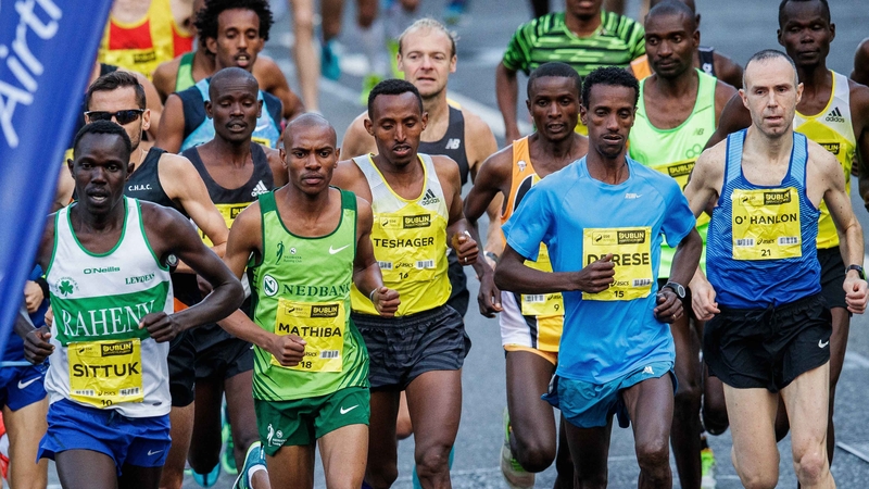 Freddy Sittuk, far left, and Gary O'Hanlon, far right, during the Dublin City marathon