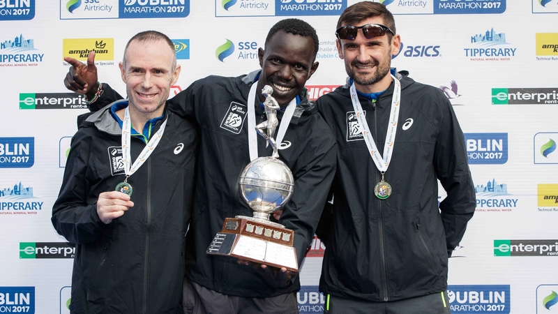 L-R: Gary O'Hanlon, Freddy Sittuk and Sergiu Ciobanu during the post-race ceremony where Sittuk was awarded the Irish national marathon title
