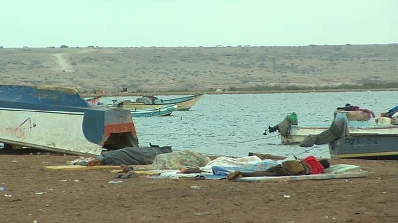 People sleep on the beach in Obock while they wait for a chance to reach Yemen
