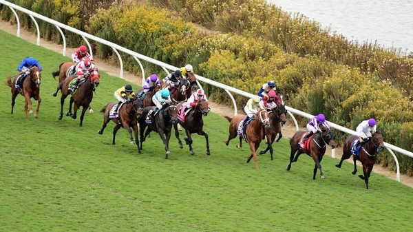 Mendelssohn ridden by Ryan Moore (#1) wins the Breeder's Cup Juvenile Turf