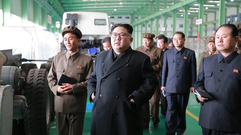 North Korean leader KimJong-un visiting a military factory