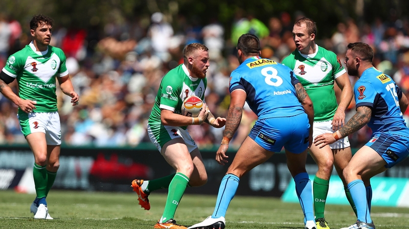 Brad Singleton of Ireland in action against Italy