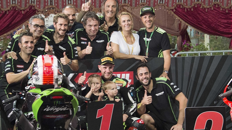 Jonathan Rea celebrates victory with his team and family