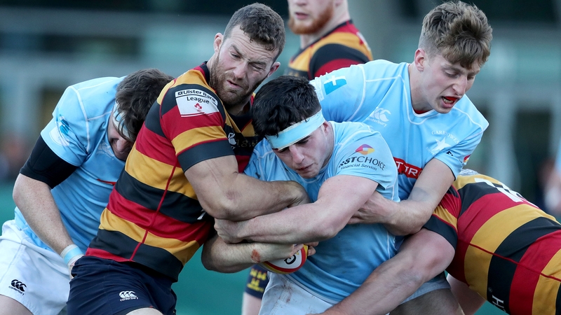 Lansdowne's Charlie Butterworth is tackled by Peadar Collins of Garryowen