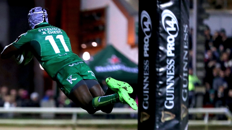 Connacht's Niyi Adeolokun dives over