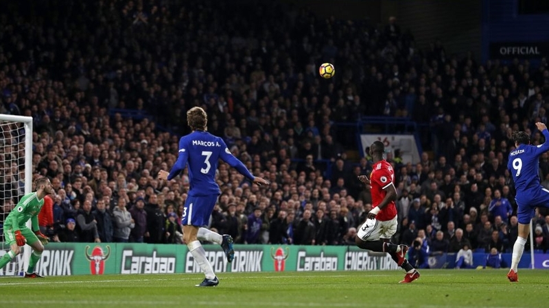 Alvaro Morata (R) scores the winner