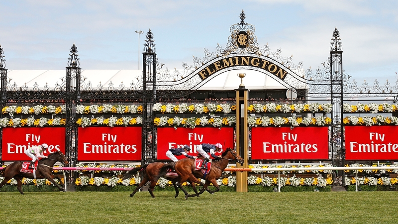 Jockey Corey Brown rides Rekindling to win the Melbourne Cup