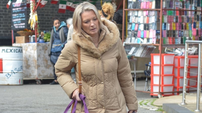 Kathy Beale tries to flee Walford after dark secret is revealed