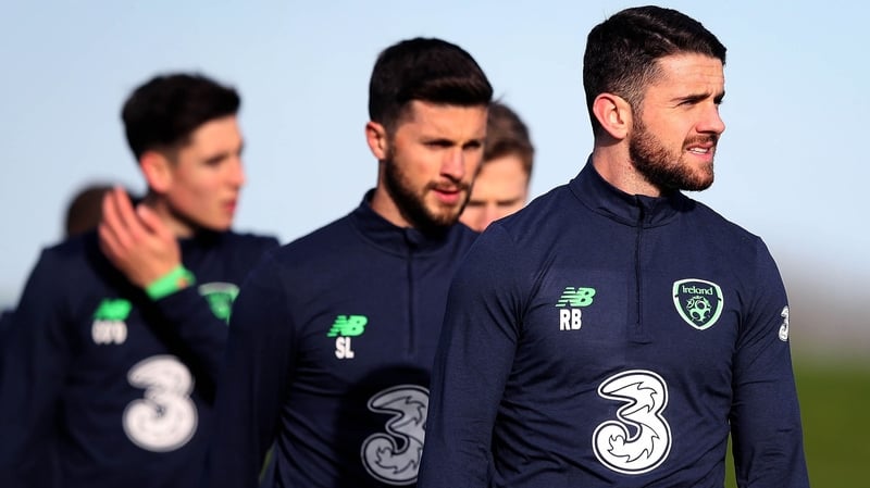 Robbie Brady (R) is eyeing another away day to remember in Denmark