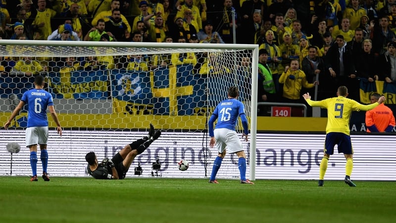 Gianluigi Buffon watches the ball go past him after a big deflection