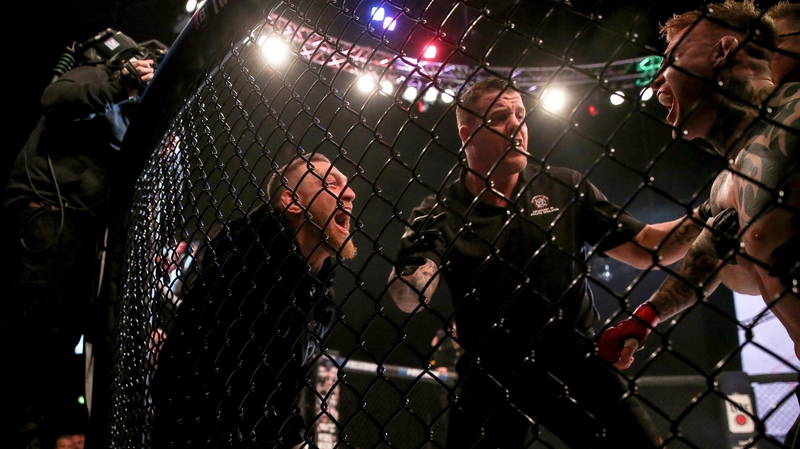 Charlie Ward (R) celebrates knocking out John Redmond with teammate Conor McGregor